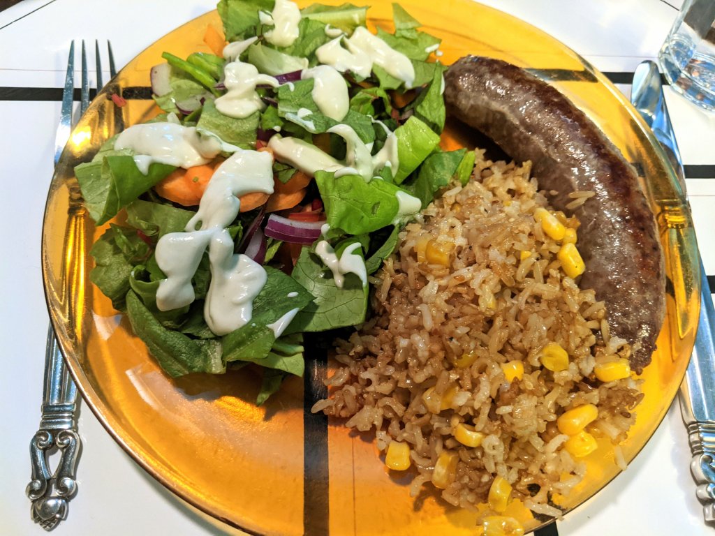 Duck and pork sausage, salad with blue cheese dressing, and tamari fried rice with corn.jpg