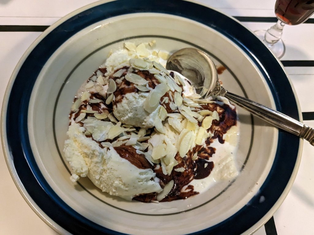 ice cream with fudge sauce and sliced almond.jpg