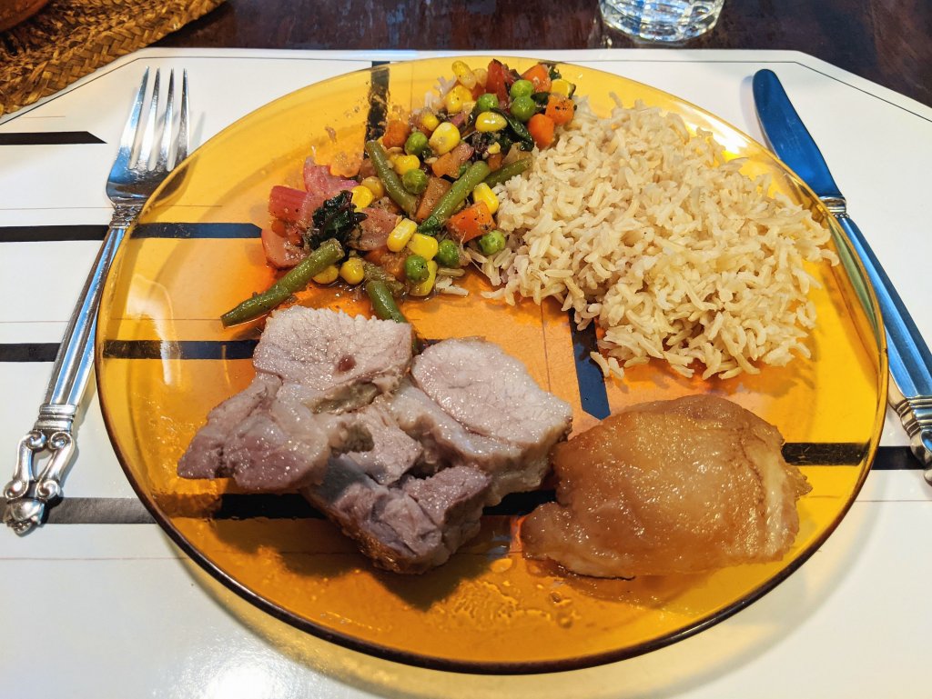 Pork loin roast, stir fried vegis, and brown basmati rice.jpg