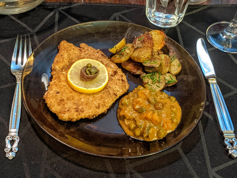 Pork schnitzel, fried potatoes, and Jaipur veggies.jpg