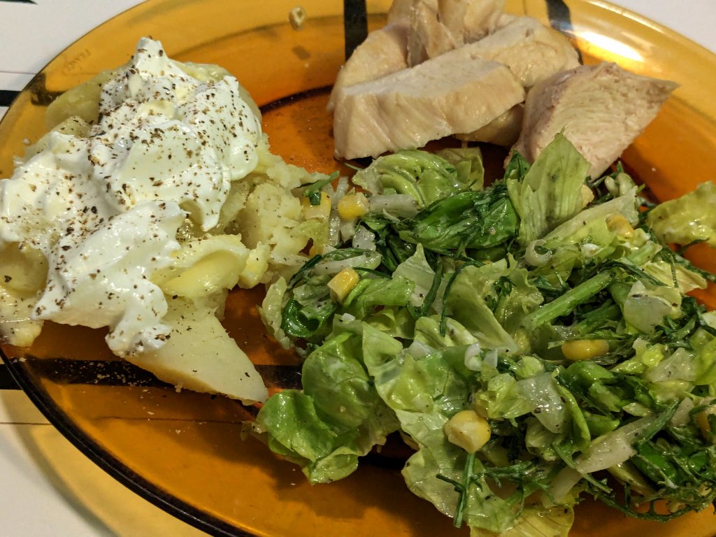 roasted chicken breast, baked potato, and a salad.jpg
