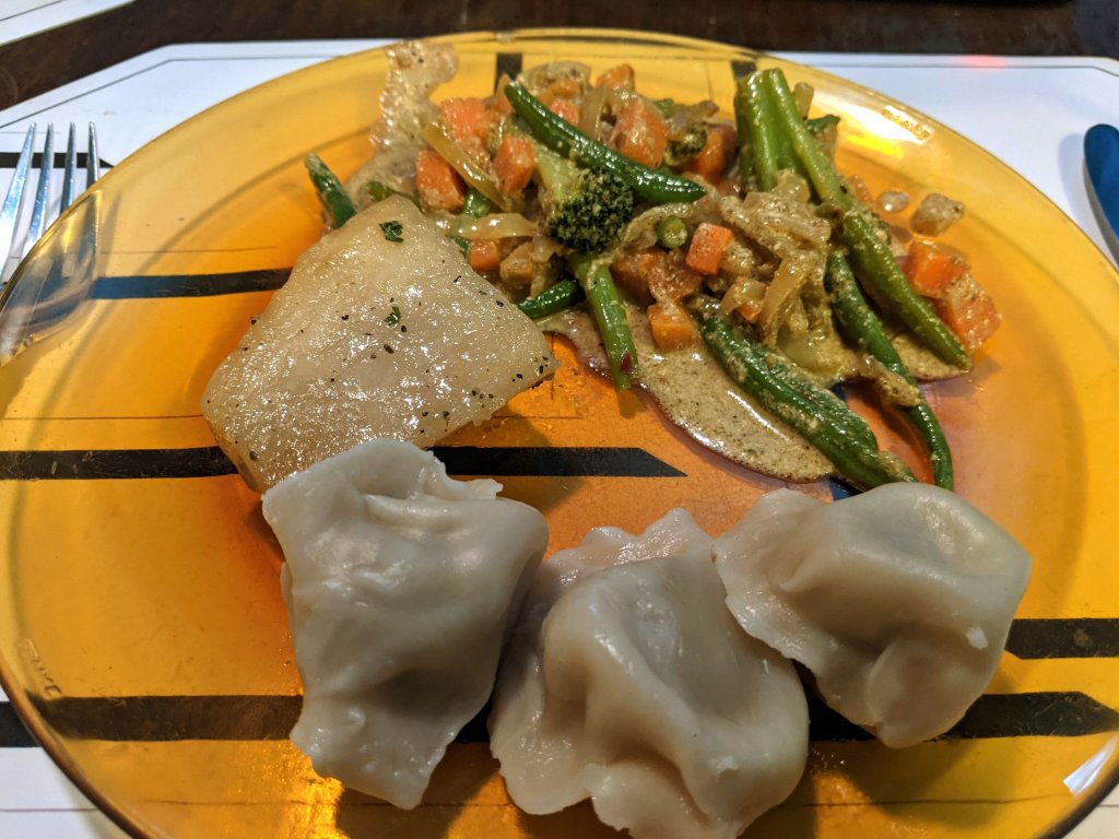 Store bought beef and curry dumplings, with curried veg and Greek potato.jpg