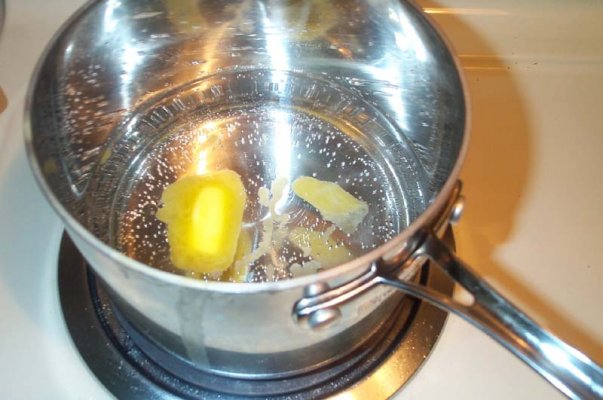 bringing water and butter to boil for rice.jpg