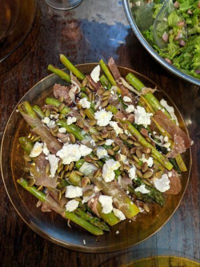 Asparagus with prosciutto, lonzo, chèvre, pumpkin seeds, honey, and EVOO and a leafy salad with .jpg