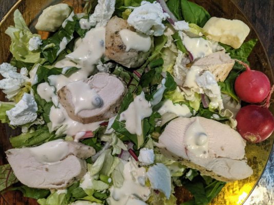 Chicken, salad with chèvre, cheese curds, radishes, and remoulade based salad dressing.jpg