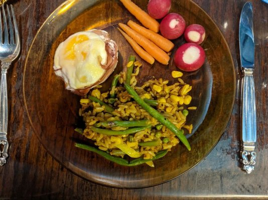 Egg in a ham cup with cheddar, rice fried with vegis and Madras curry paste, and baby carrots an.jpg