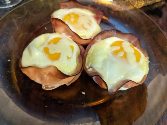 Eggs in ham cups with cheddar.jpg