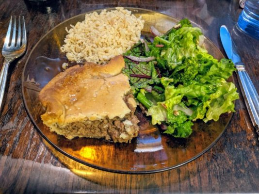 Tourtière with gravy, salad, and brown basmati rice.jpg