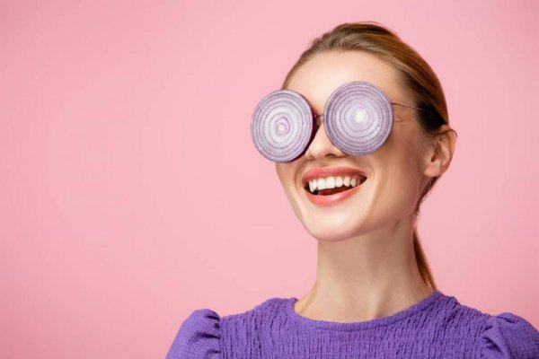 stock-photo-smiling-woman-wearing-eyeglasses-purple.jpg