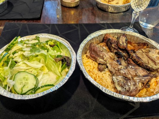 Lamb chops, rice pilaf, roast potatoes, and salad.jpg