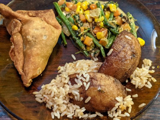 Cheese and spinach samosas, vegis with Madras paste, and leftover rice pilaf and roast potato.jpg