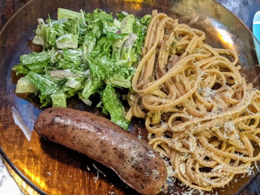 Italian sausage, salad, and linguine with a zucchini based sauce.jpg