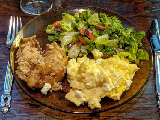 French omelet, salad, and leftover rice pilaf and roast potatoes.jpg