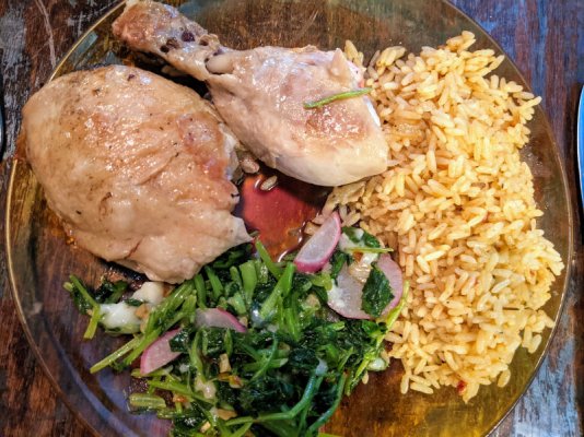 Roast chicken leg, sautéed radish greens, and rice pilaf.jpg