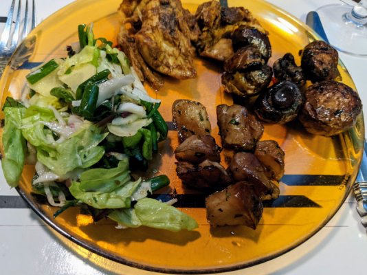 Shish taouk marinated chicken, roasted sunroots, roasted mushrooms, and salad.jpg