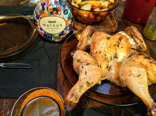 New Year's Eve roasted chicken and veggies, drippings for dipping the whole grain baguette, an...jpg