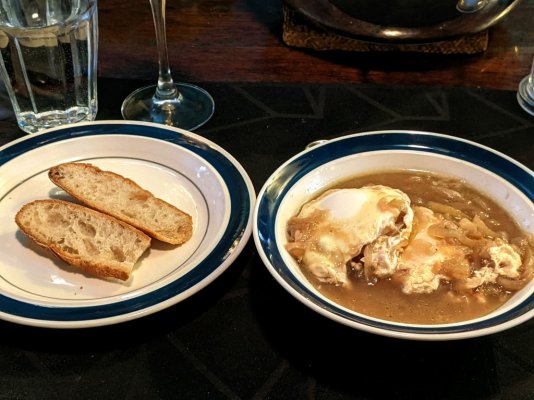 Carabaccia - Tuscan Onion Soup with a couple of  Eggs Poached in the Soup and whole wheat bagu...jpg