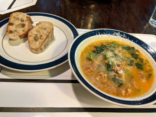 White bean and Italian sausage soup with grated Grana Padano and whole wheat baguette.jpg