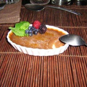 Chocolate creme brulee with fresh fruit and mint.