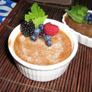 Chocolate creme brulee with fresh fruit and mint.
