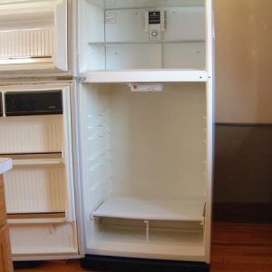 I took advantage of the fact I had an empty refrigerator to leasurely clean it.  I completely disassembled the interior and washed the shelves in the 