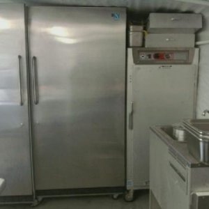 Two refrigerators are inside of every Army CK mobile kitchen.