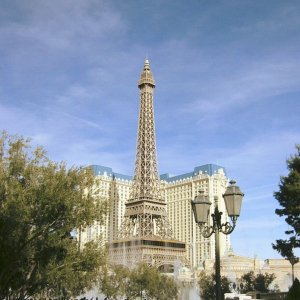View of Eiffel Tower over Bellagio fountain.