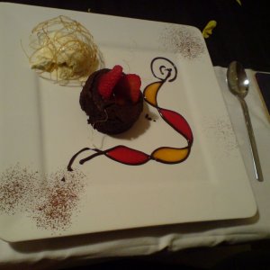 Warm chocolate fudge brownie, vanilla ice cream and strawberry and passionfruit coulis.