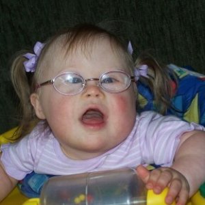 Here is MayMay (Mayson) with her glasses on.  She's playing!
