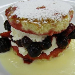 Trifle of mixed berries on Genoise sponge with Sauce Anglaise
