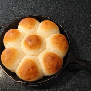 salt and pepper's dinner rolls in a cast iron skillet.