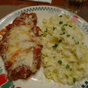 Chicken Parmesan with homemade Fettuccine with a simply dressing of Olive Oil and Cheese