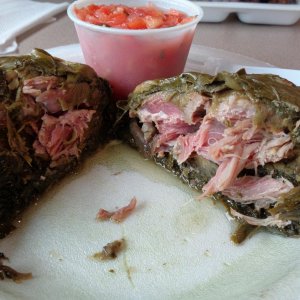 At Young's Fish Market in Kalihi, Pork Lau Lau, it's nice piece of Pork (or Chicken or Fish or Beef) wrapped in Taro leaves, then Ti Leaves and steame
