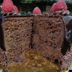 Flourless Chocolate Cake with Raspberry filling and chocolate ganuche icing, our Wedding Anniversary Cake