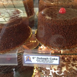 Napoleon's Bakery Chocolate Dobash Cake
(http://www.cookinghawaiianstyle.com/component/recipe/recipes/detail/589/from-scratch-chocolate-dobash-cake)