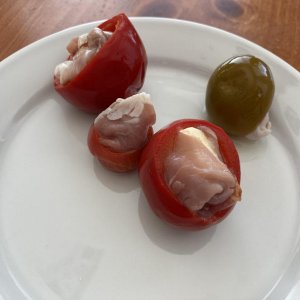 Hot Cherry Peppers, stuffed with a piece of Sharp Provolone Cheese, wrapped in Prosciutto.  It took me a LONG time to find Hot Cherry Peppers here in 