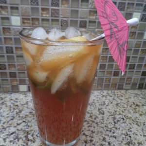 Plantation Iced Tea ala John Dominis, a long gone restaurant in Honolulu.
Very simple: Iced Tea, Pineapple Juice and Mint