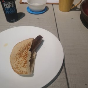 argentinian naknikia in half a pita