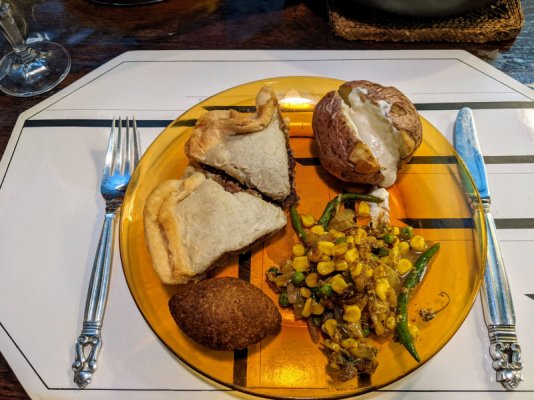 Click image for larger version

Name:	Baked potatoes, kebbe, tourtière,, and vegis in masala & yogourt.jpg
Views:	10
Size:	156.4 KB
ID:	50337