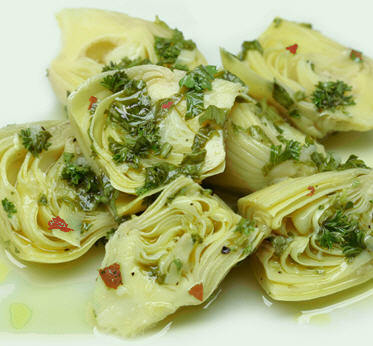 Artichokes and Olive oil.

Braised baby chokes with chopped herbs and kalamata olives.