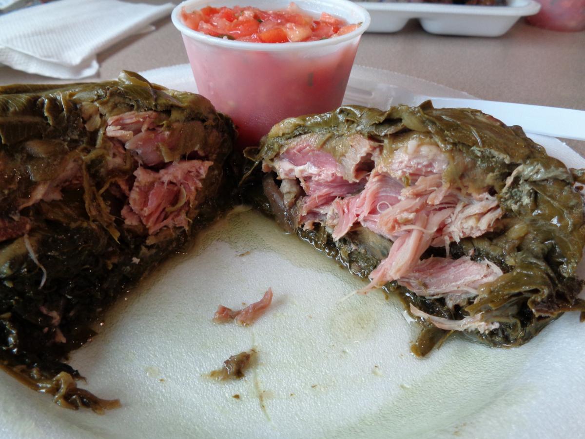 At Young's Fish Market in Kalihi, Pork Lau Lau, it's nice piece of Pork (or Chicken or Fish or Beef) wrapped in Taro leaves, then Ti Leaves and steame