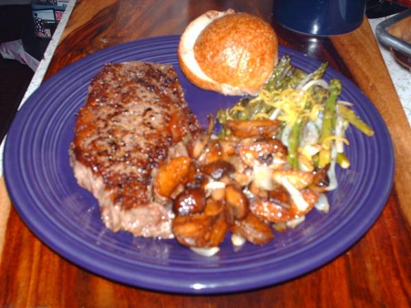 Bison, sauteed mushrooms and onions, roasted asparagus with lemon zest and plain rice, sour dough roll with butter,