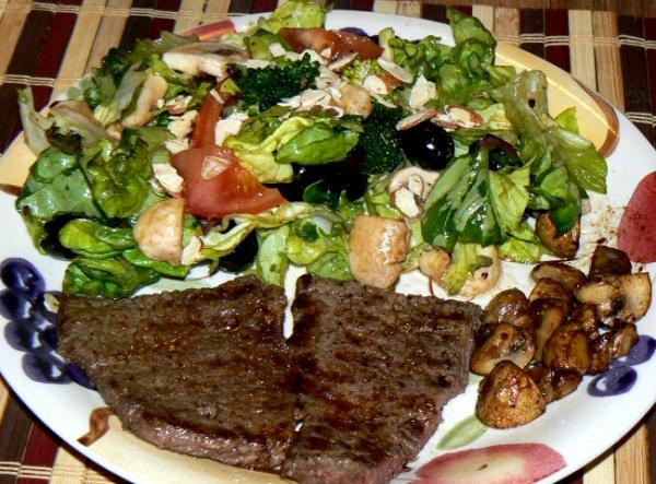 Chuck steak, sautéed mushrooms and salad
