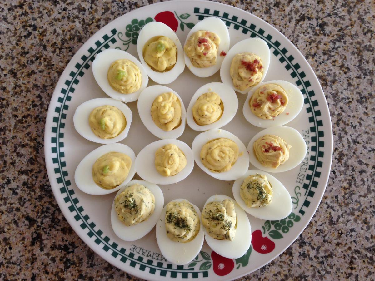 Deviled Eggs with assorted flavorings.
Change it up, try some Wasabi Paste, Crumbled Bacon, Dill Pickle Relish and fresh Dill, loads of Mustard ...  o