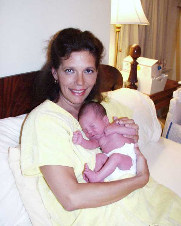 Fisher 2 hours old with Fisher's Mom (me)
