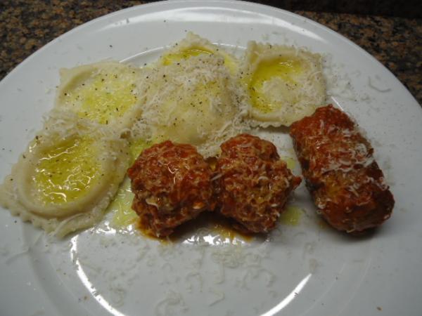 Homemade Ravs and Meatballs with a piece of Italian Sausage