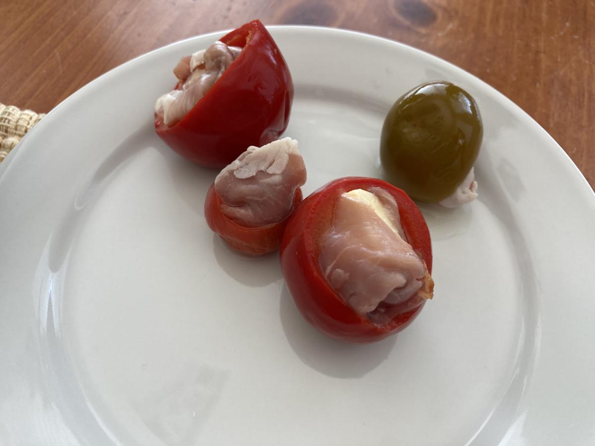 Hot Cherry Peppers, stuffed with a piece of Sharp Provolone Cheese, wrapped in Prosciutto.  It took me a LONG time to find Hot Cherry Peppers here in 