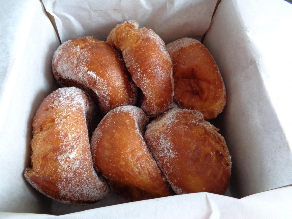 Leonard's Bakery Malasadas, they're Portuguese Donuts.  I must, as many others do, eat one fresh out of the fryer, standing in the parking lot before 