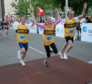 Madeleine is in the middle. They just did a 5K race (darned if I can remember what it was for!) called the Little Big Run