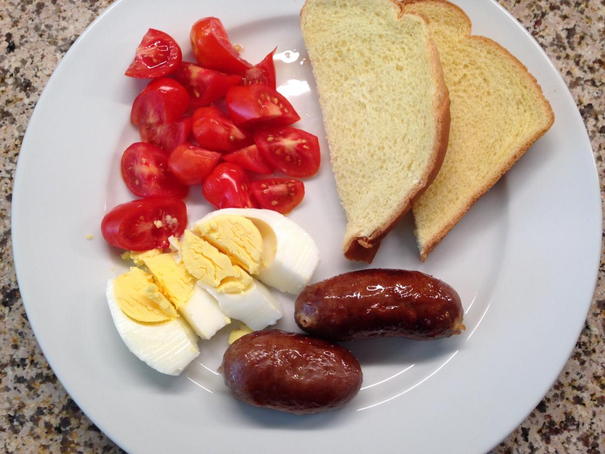 Miko Foods of Hawaii Scottish Brand Bangers, my all time favorite!  I served it this time with a hard boiled Egg, Brioche toast and diced Tomatoes.